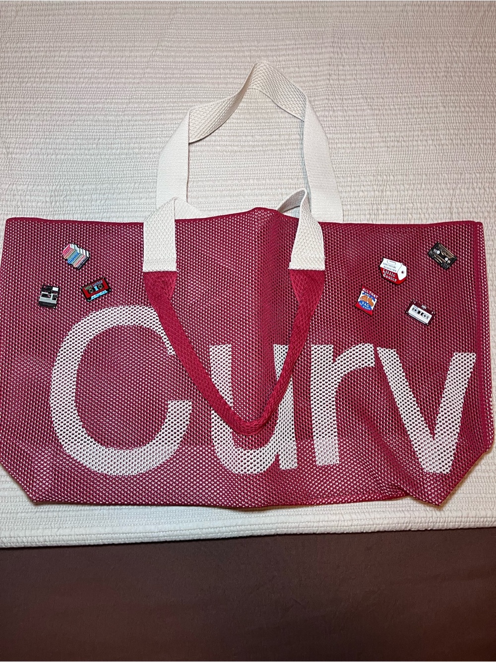 Curves Perforated Tote by Sean Brown